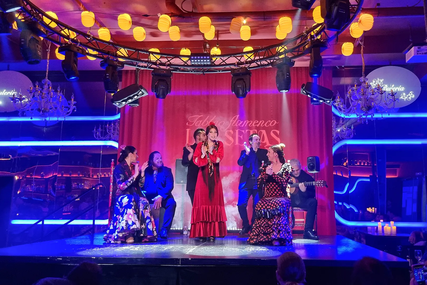 Flamenco dancers performing at Las Setas in Seville, Spain.