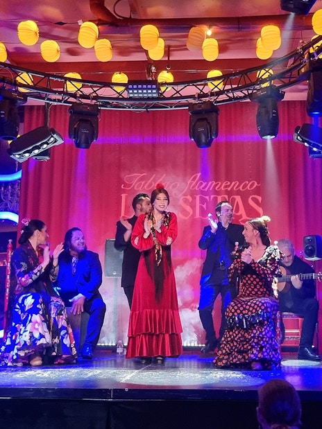 Flamenco dancers performing at Las Setas in Seville, Spain.