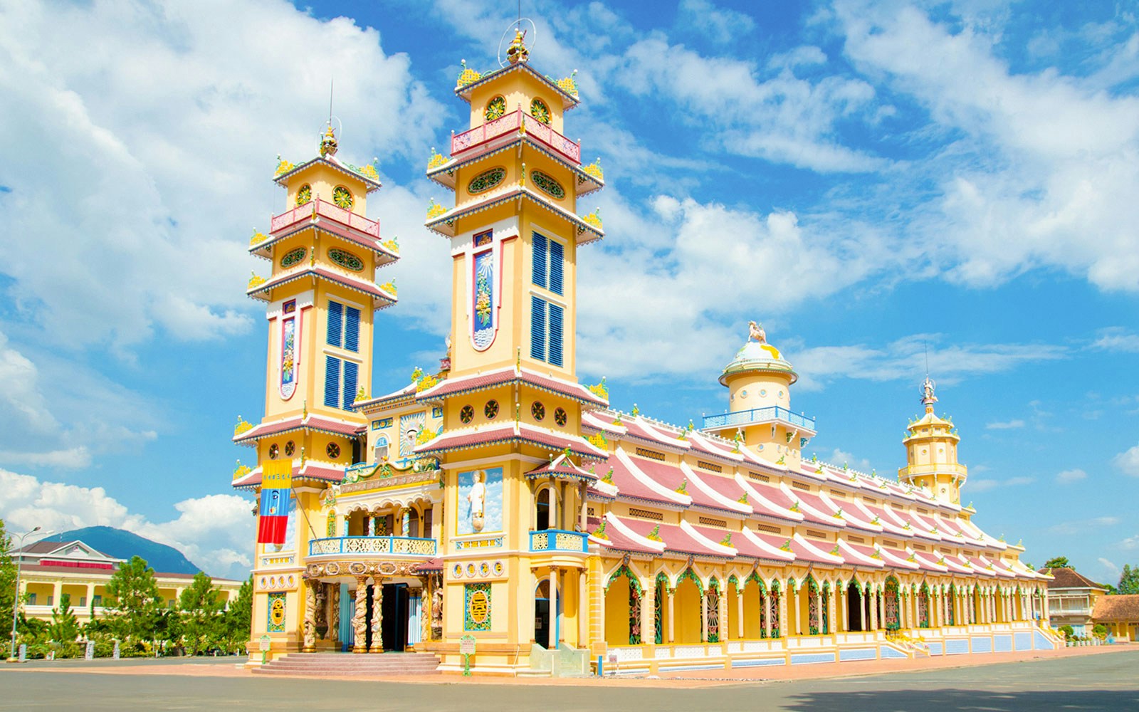 Cao Dai Temple with colorful facade and intricate architecture in Tay Ninh province, near Ho Chi Minh City.