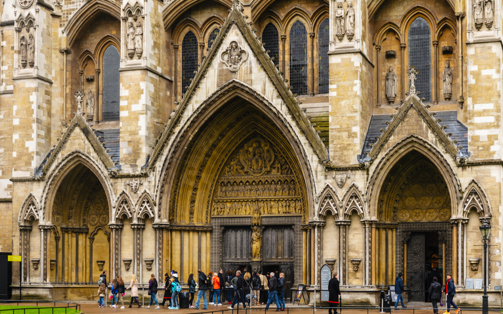 Visitors entering Westminster Abbey during exclusive guided tour.