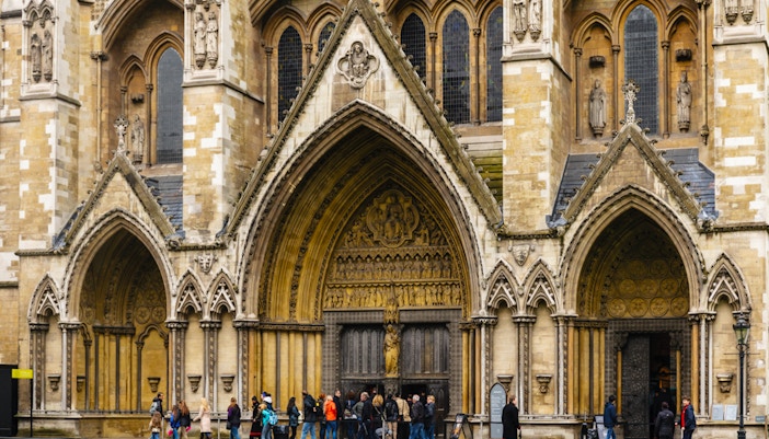 Visitors entering Westminster Abbey during exclusive guided tour.