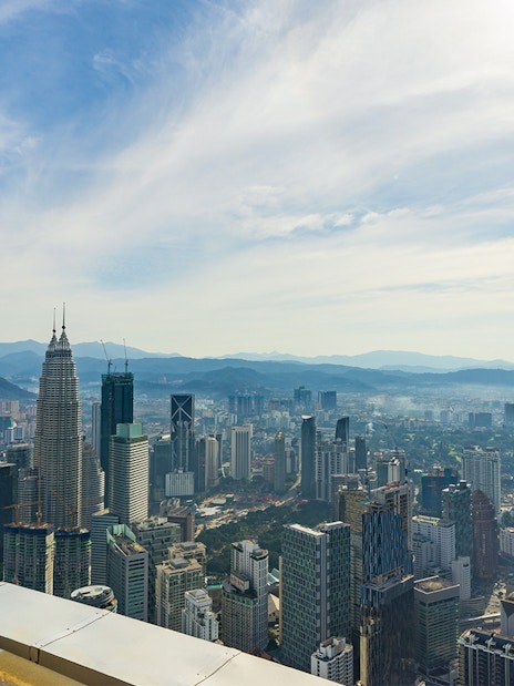 Kuala Lumpur skyline with Petronas Towers from KL Tower Sky Deck.