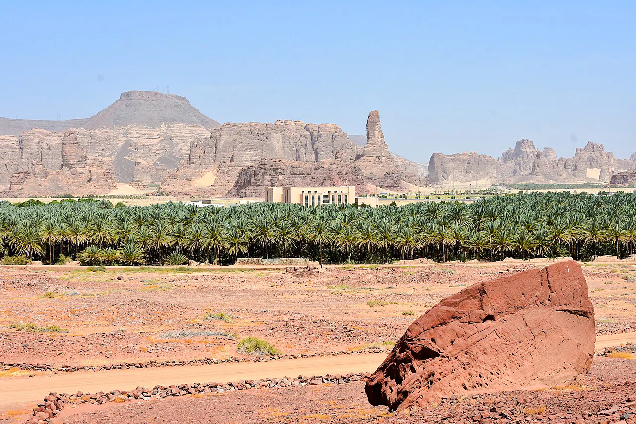 AlUla Old Town landscape with palm oasis and rocky mountains in Medina.