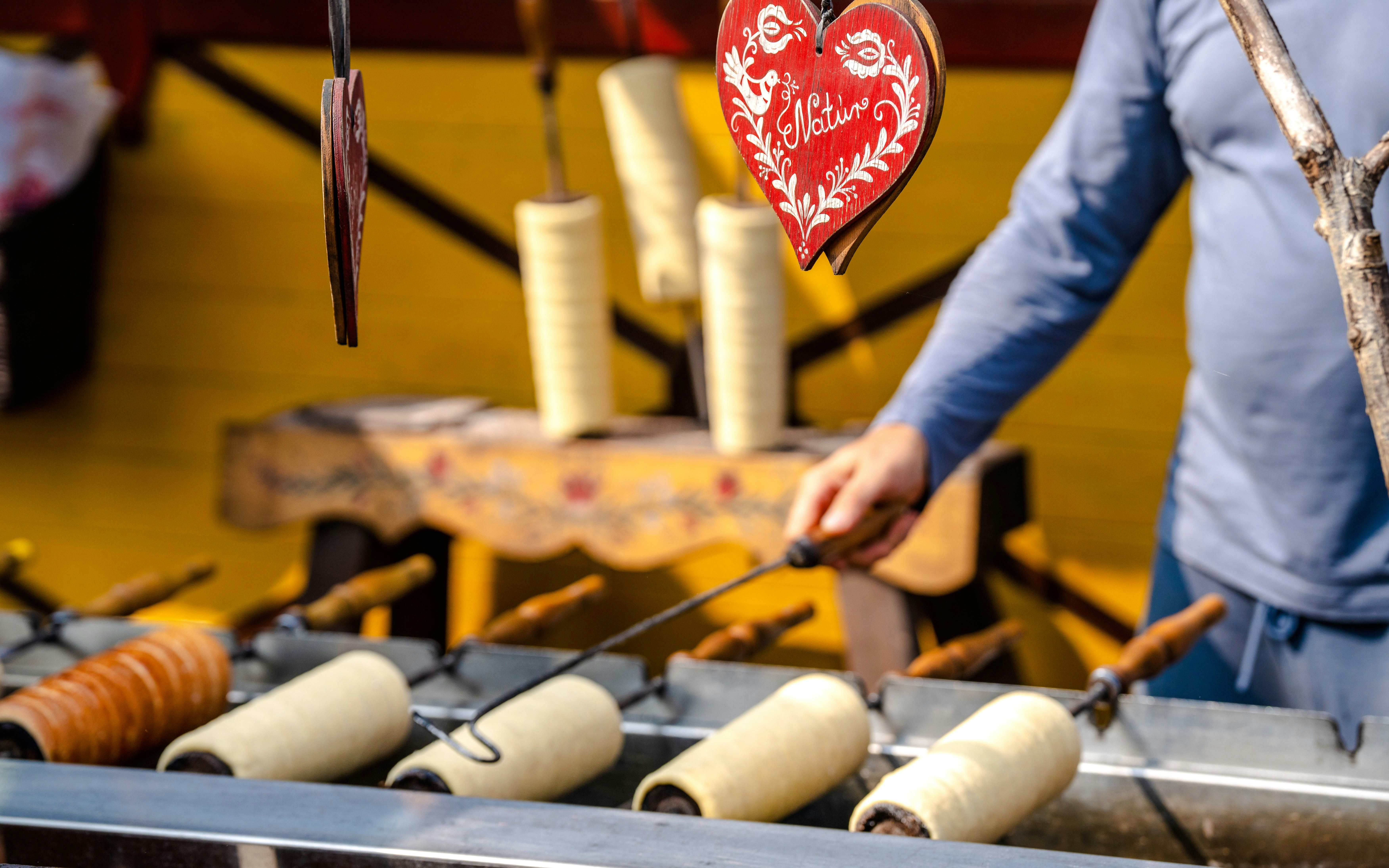 Chimney cakes being prepared at a Christmas market in Budapest.