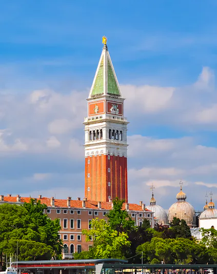 St. Mark Bell Tower in Venice with tourists admiring the view.