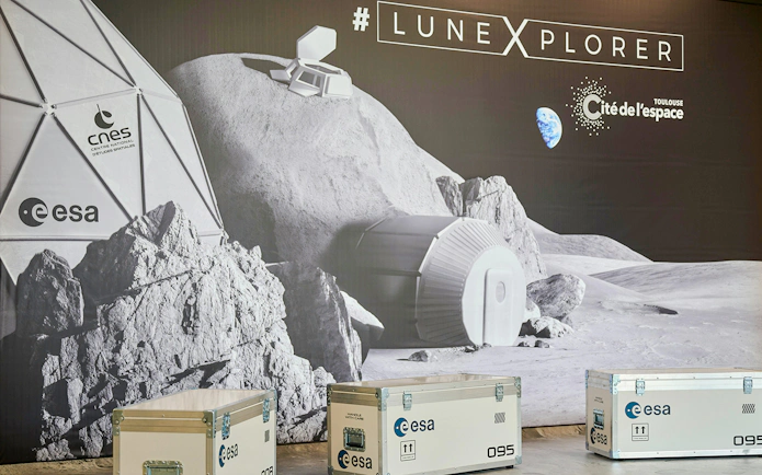 Lunar exhibit with ESA and CNES logos at Cité de l’Espace, France.
