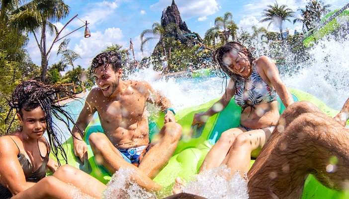 Guests enjoying a water ride at Universal Studios Resort waterpark in Orlando, Florida.