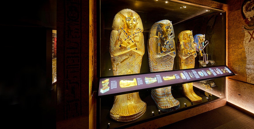 Golden sarcophagi in the Burial Chamber of Tutankhamun, Egypt.