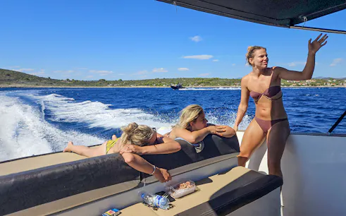 Guests relaxing on a boat during Bol, Hvar, Pakleni islands & Šolta tour.