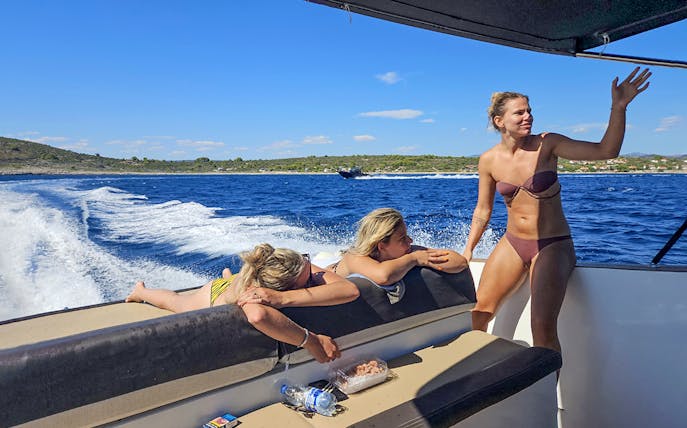 Guests relaxing on a boat during Bol, Hvar, Pakleni islands & Šolta tour.