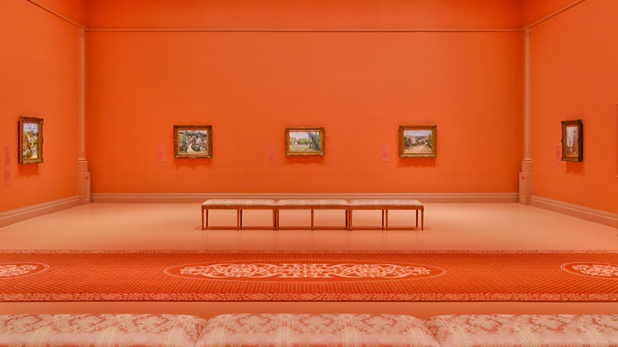 French Impressionist paintings displayed in an orange gallery at NGV, Melbourne Winter Masterpieces 2025.