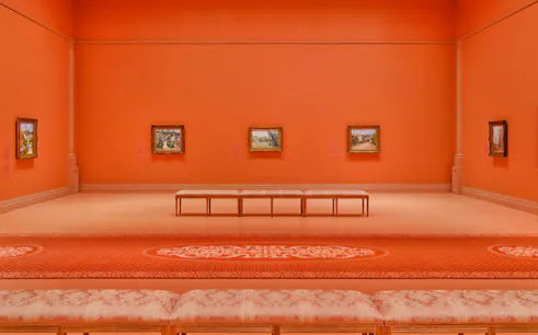 French Impressionist paintings displayed in an orange gallery at NGV, Melbourne Winter Masterpieces 2025.
