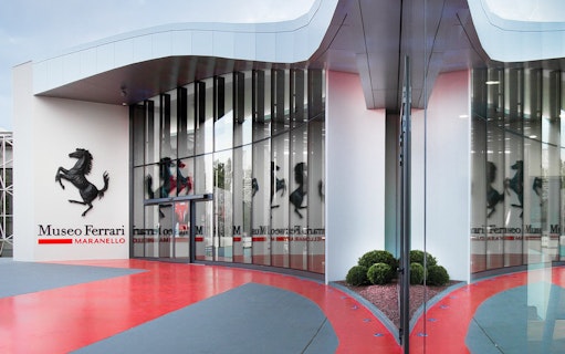 Ferrari Museum Maranello entrance with iconic prancing horse logo.