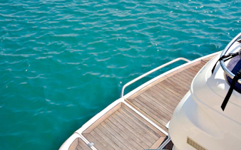 Boat deck on the Bosphorus, Istanbul, with clear blue water.