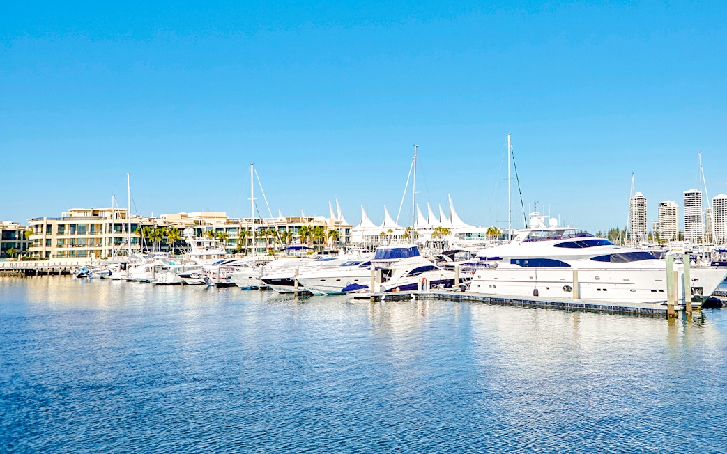 Marina Mirage view with yachts docked, Gold Coast buffet lunch setting.
