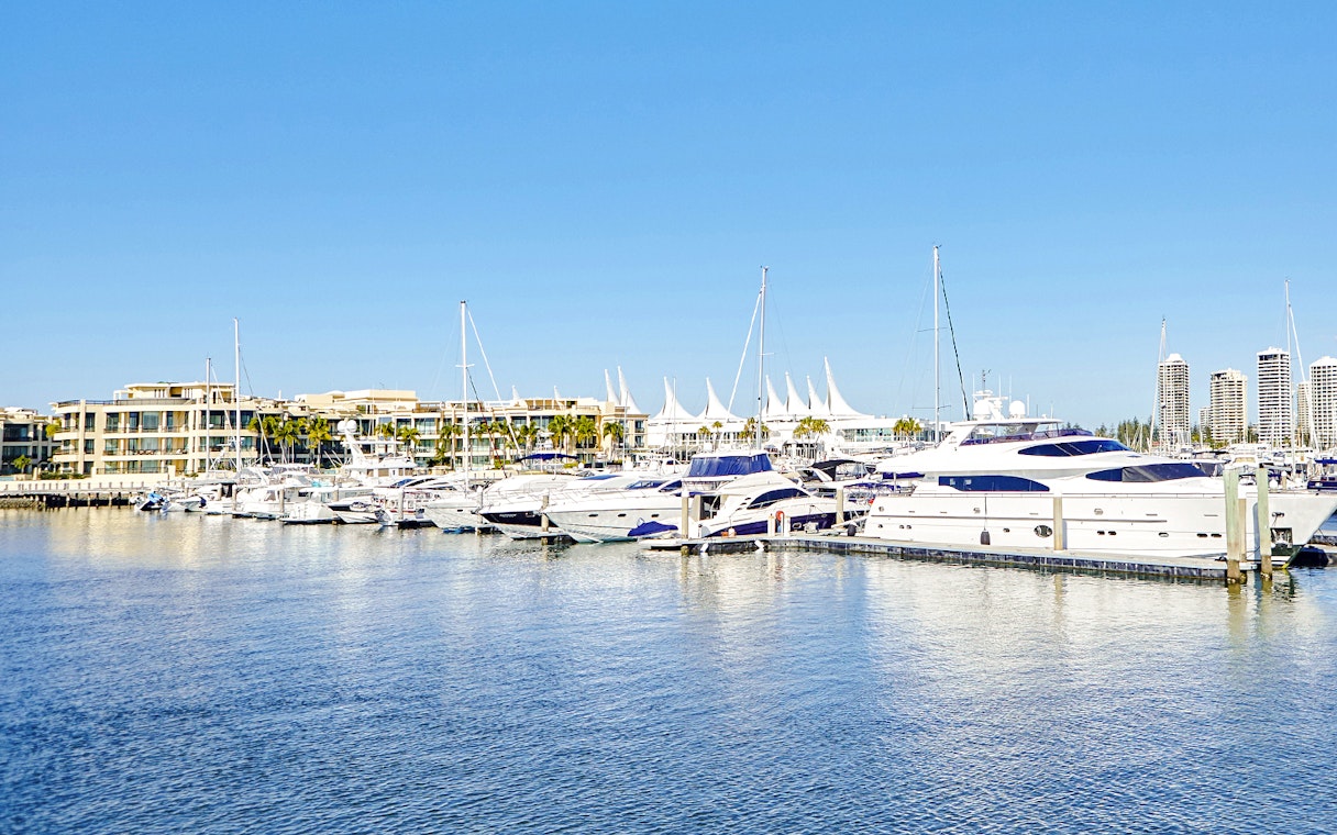 Marina Mirage view with yachts docked, Gold Coast buffet lunch setting.