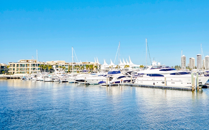 Marina Mirage view with yachts docked, Gold Coast buffet lunch setting.