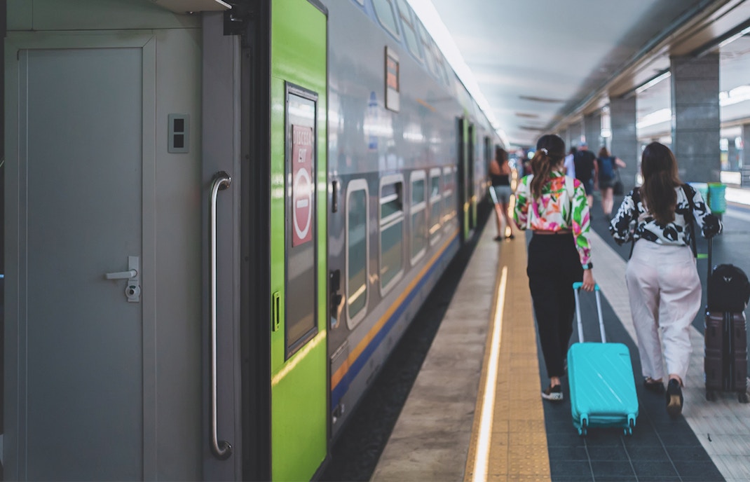 Naples underground metro station with commuters.