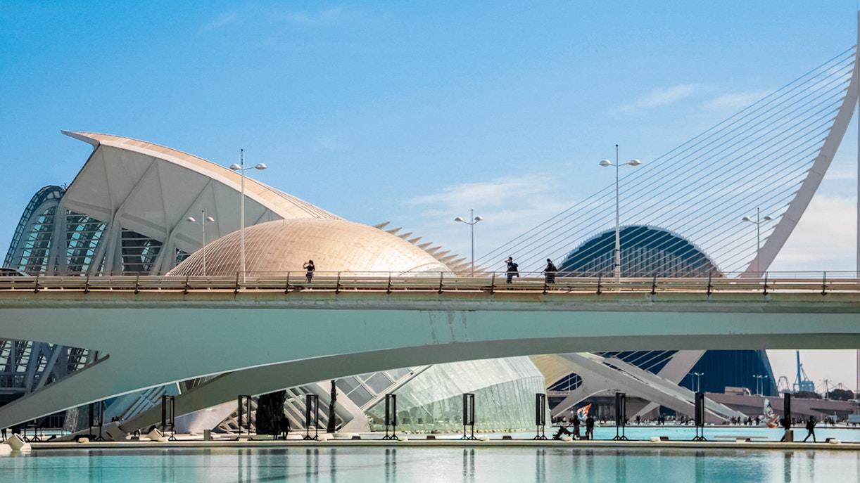 Tourist on bridge at Hemisfèric, City of Arts and Sciences, Valencia.