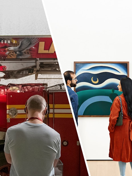 Fire truck display and visitors viewing art in a museum.