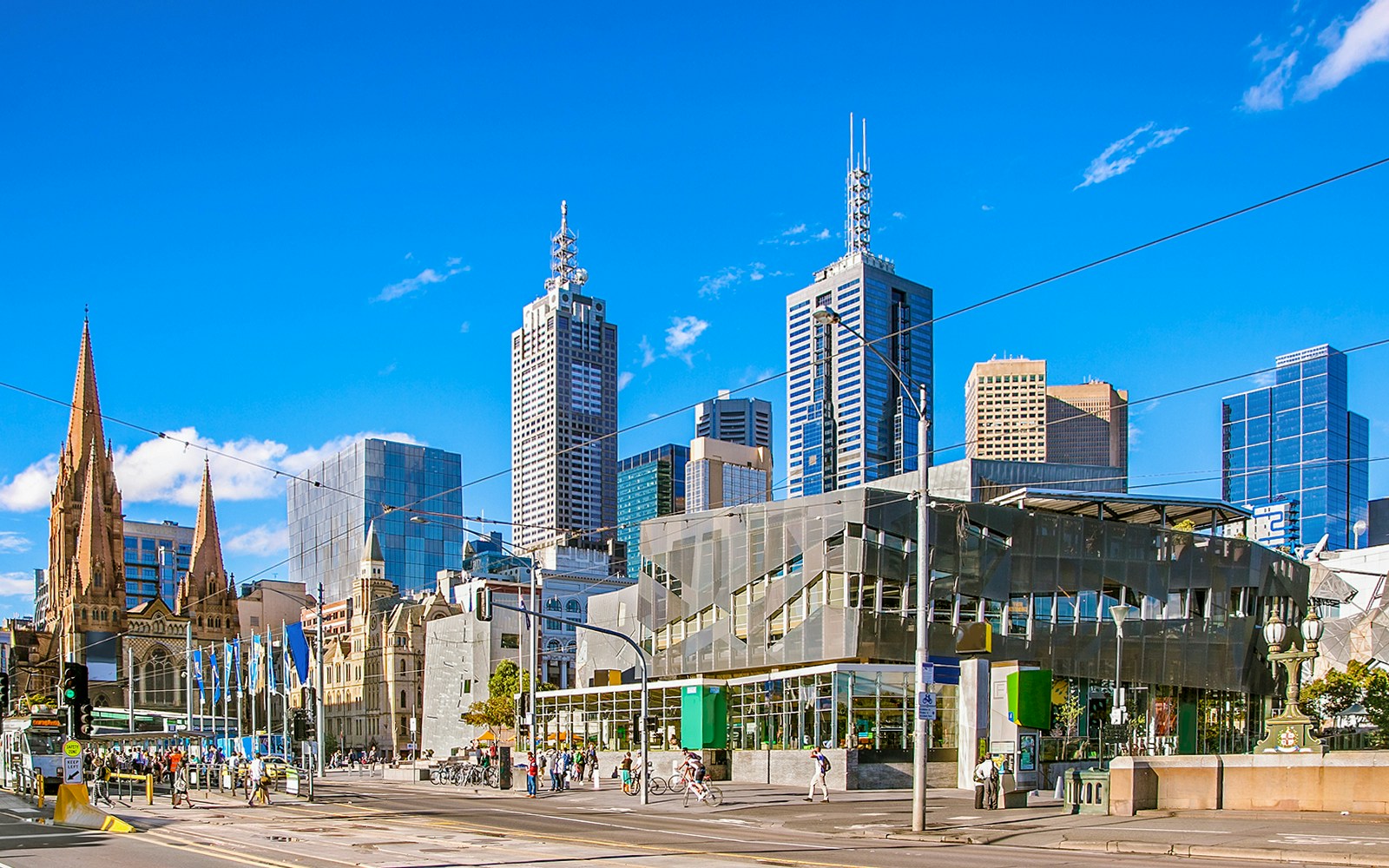 Federation Square with Melbourne skyline in the background, Australia.