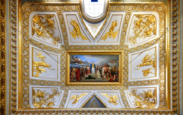 Ceiling fresco and gold details in the Royal Palace of Caserta, Italy.