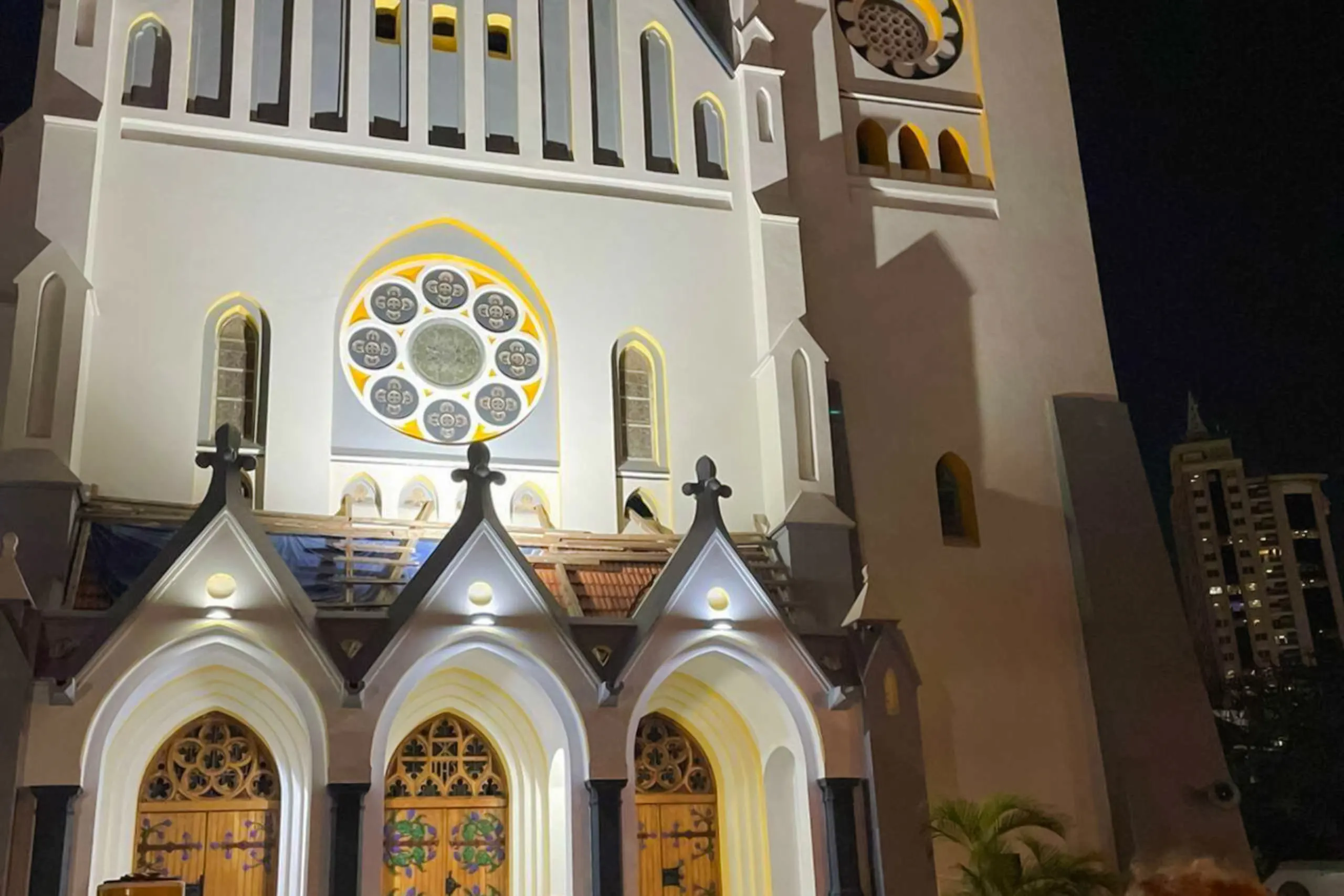 Historic church facade illuminated at night, Dar es Salaam Old Town Walking & Food Tour, Zanzibar.