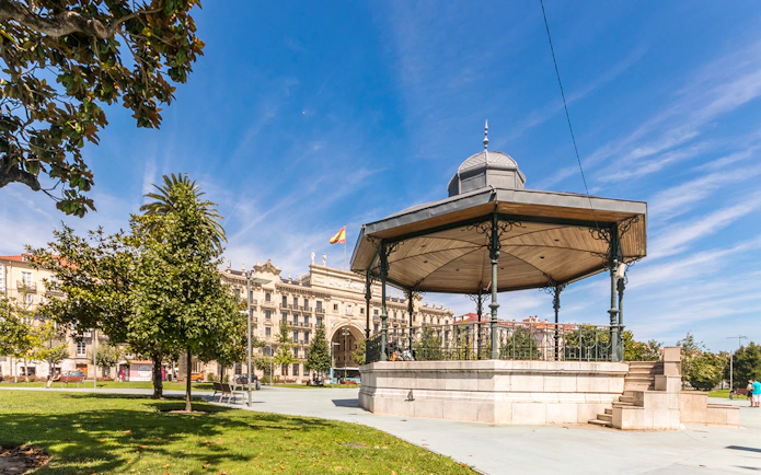 Santander city square with a gazebo and historic buildings in the background.