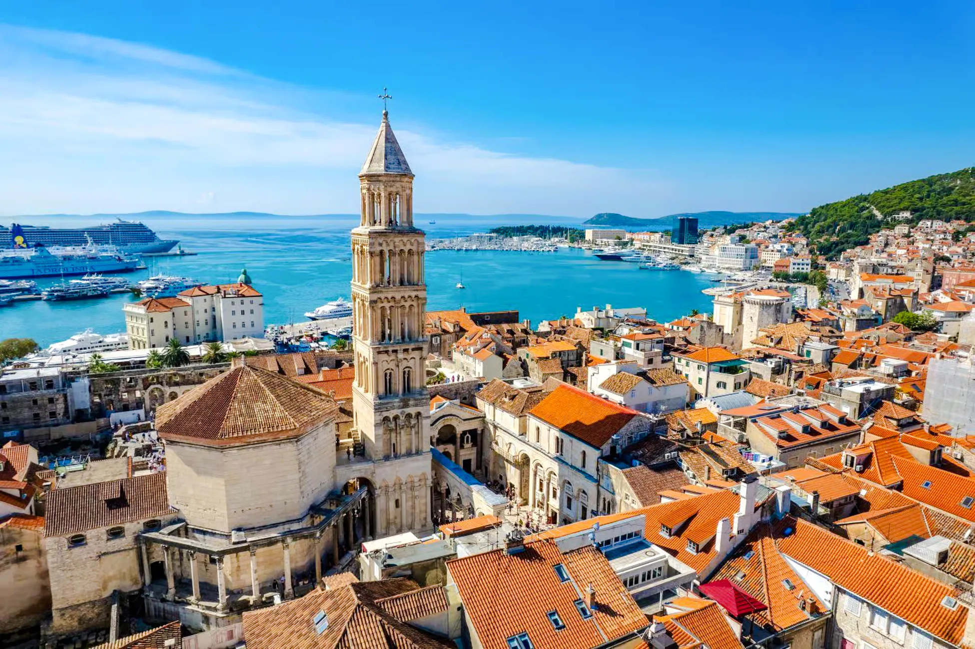 Diocletian's Palace and Split harbor view, Croatia, with historic architecture and cruise ships.