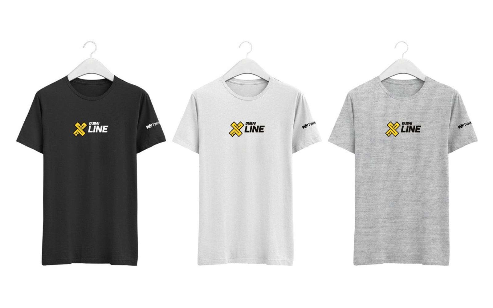 T-shirts with XLine Dubai Marina logo on hangers.