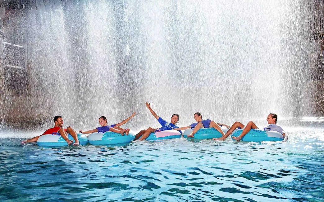 Visitors enjoying a water ride at Wild Wadi Water Park, Dubai.