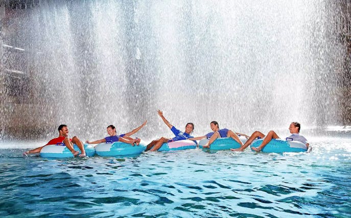Visitors enjoying a water ride at Wild Wadi Water Park, Dubai.