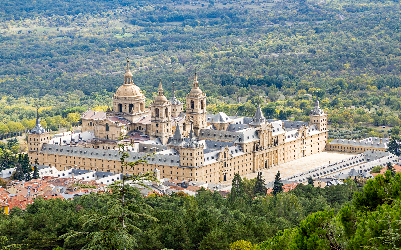El Escorial Monastery with surrounding gardens in San Lorenzo de El Escorial, Spain.