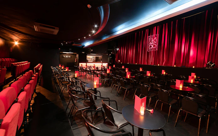 Teatro Flamenco Madrid interior with red seating and stage.