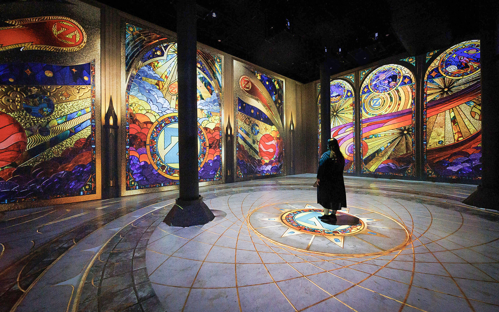 Guests viewing digital art projections at ARTECHOUSE New York exhibit.
