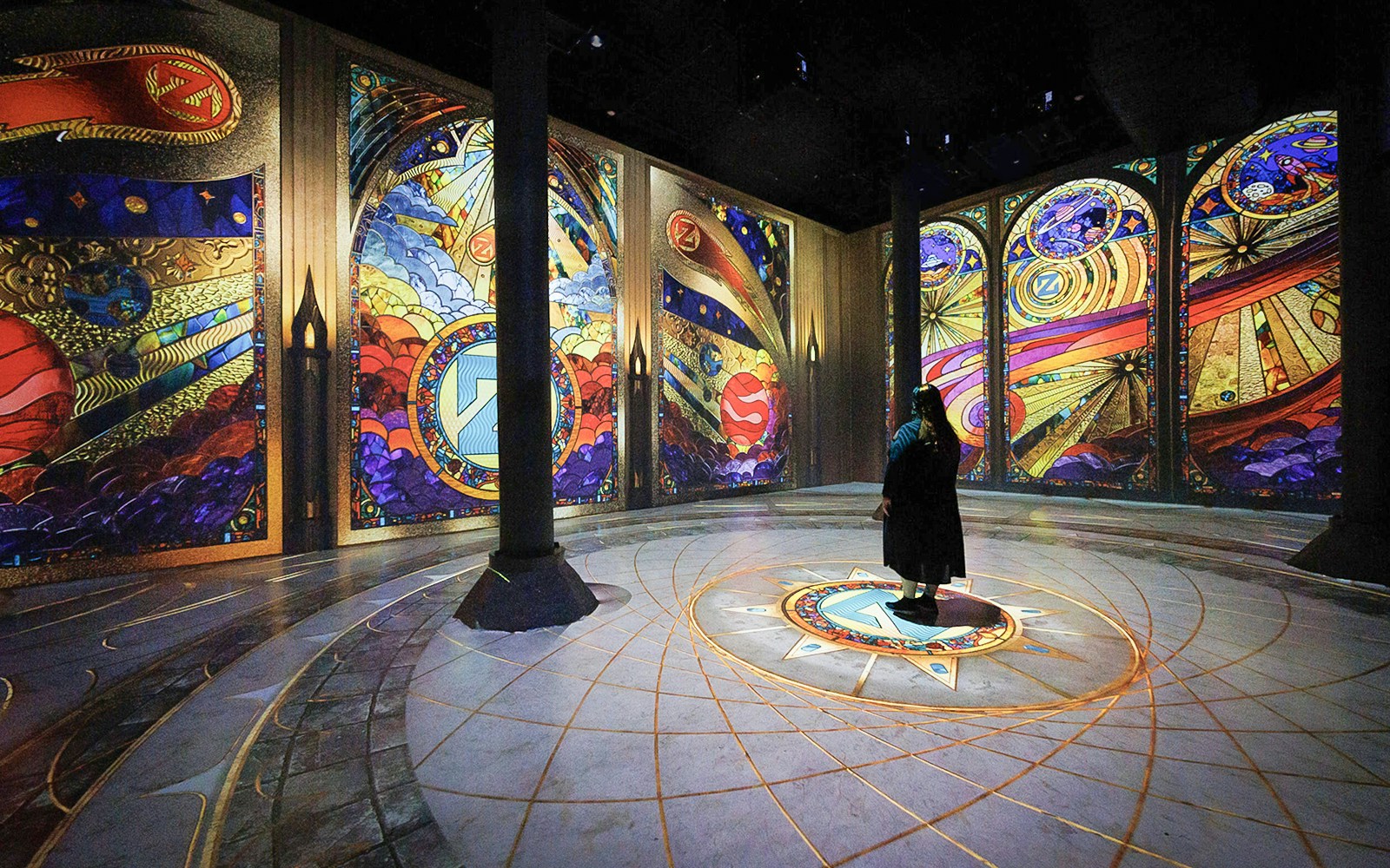 Guests viewing digital art projections at ARTECHOUSE New York exhibit.