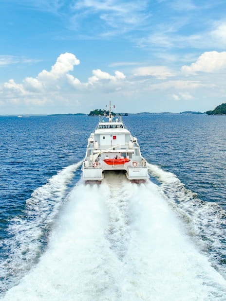 Ferry traveling from Singapore to Bintan across the open sea.