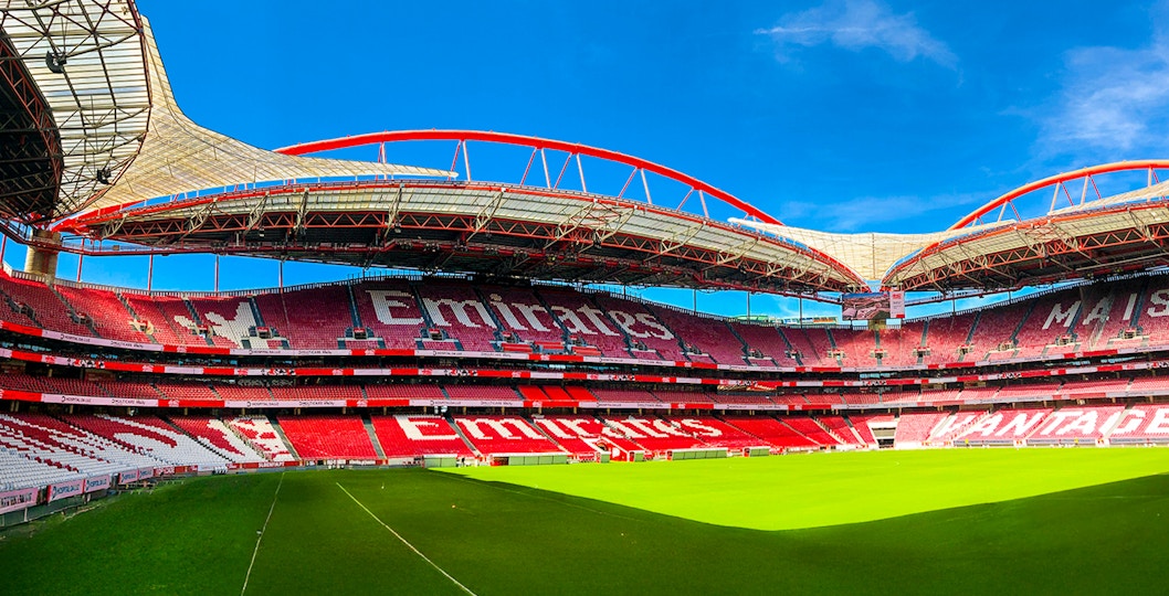 Benfica Stadium field view with seating and goalposts, Lisbon, Portugal.