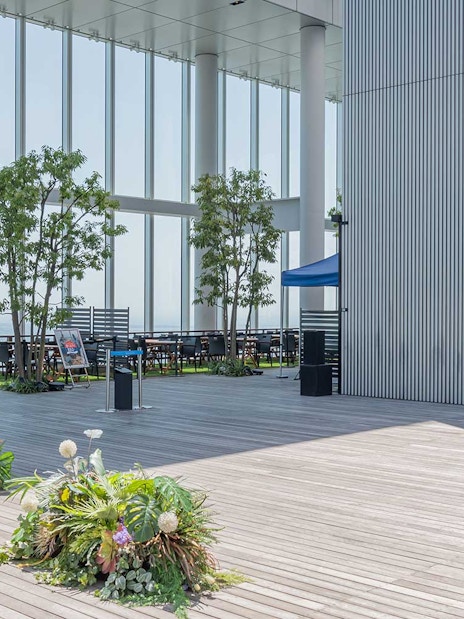 Harukas 300 Observatory deck with seating and greenery, Osaka, Japan.