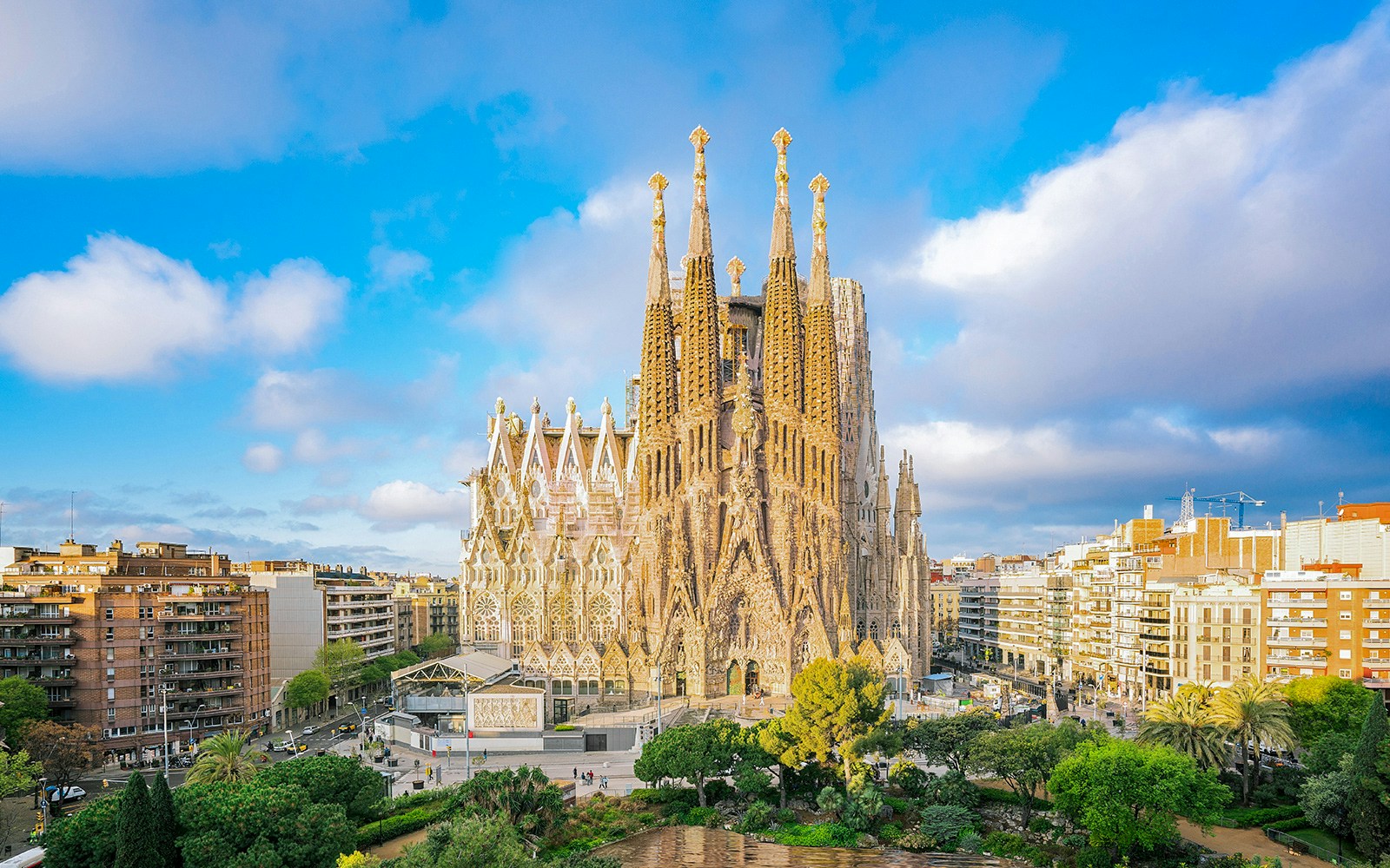 Sagrada Familia Cathedral in Barcelona with surrounding cityscape.