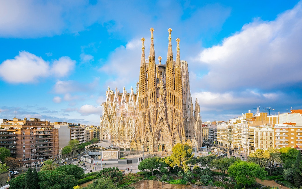 Sagrada Familia Cathedral in Barcelona with surrounding cityscape.
