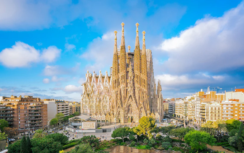 Sagrada Familia Cathedral in Barcelona with surrounding cityscape.