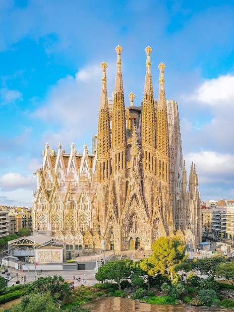 Sagrada Familia Cathedral in Barcelona with surrounding cityscape.