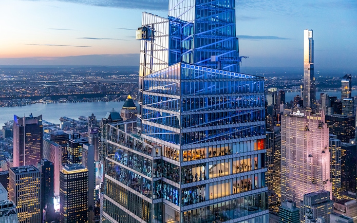SUMMIT One Vanderbilt observation deck with city skyline at dusk, New York City.