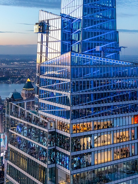 SUMMIT One Vanderbilt observation deck with city skyline at dusk, New York City.