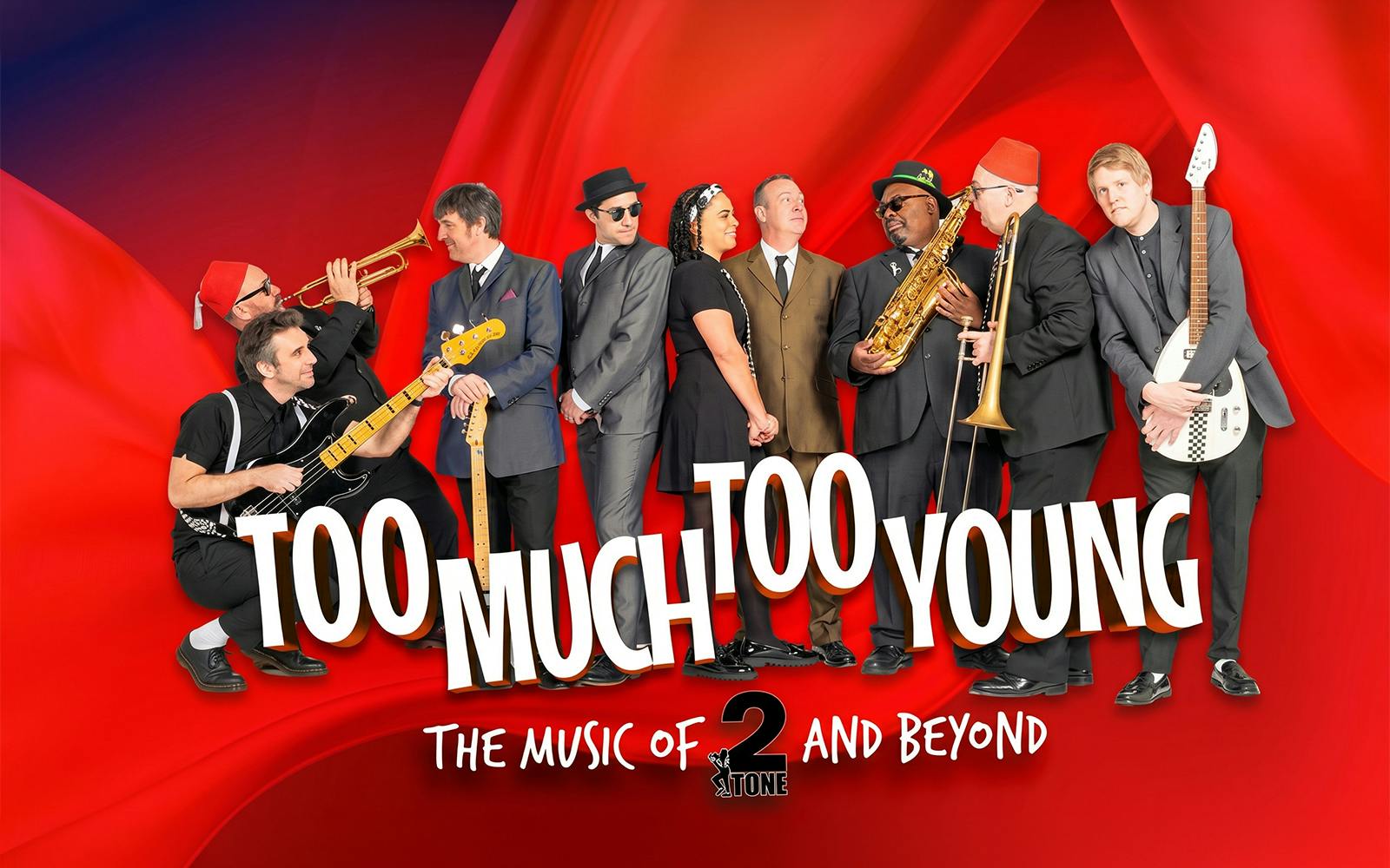 Band performing "Too Much Too Young" with instruments on a red background.