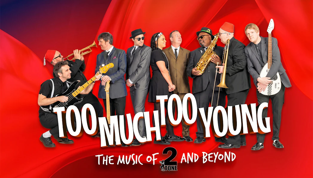Band performing "Too Much Too Young" with instruments on a red background.