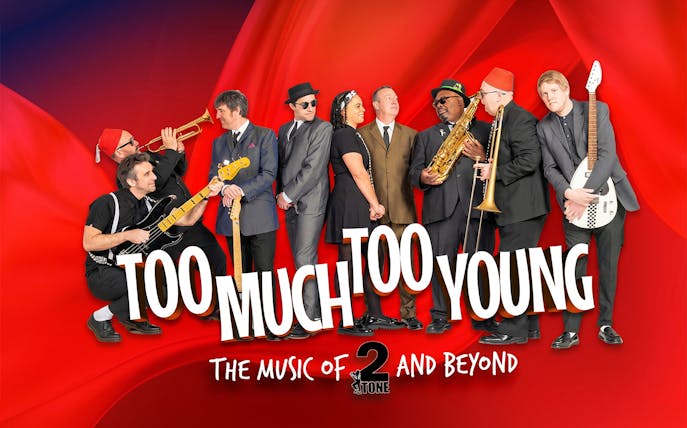Band performing "Too Much Too Young" with instruments on a red background.