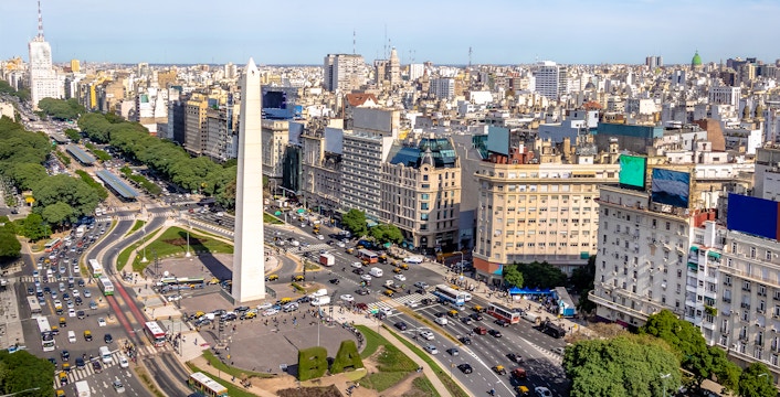 Aerial view of Buenos Aires cityscape with the Obelisk and bustling streets.