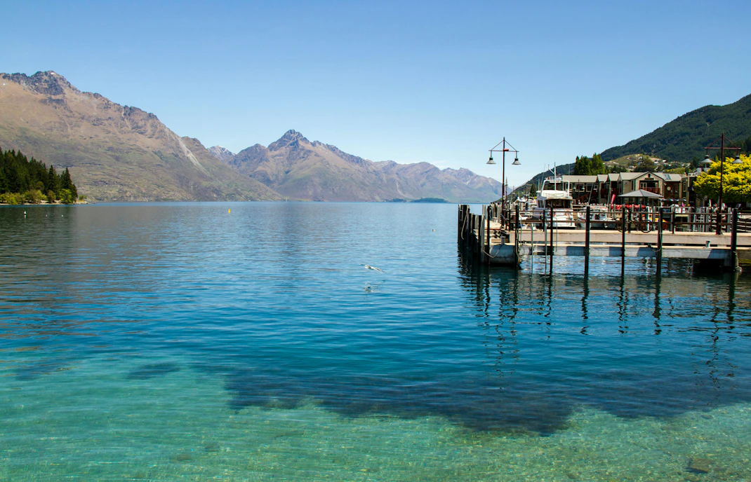 Steamer Wharf at Lake Wakatipu with mountains in Queenstown, New Zealand.